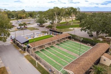 RARE OPPORTUNITY TO OWN A WATERFRONT CORNER VILLA NESTLED IN on Highland Lakes Executive Golf Course in Florida - for sale on GolfHomes.com, golf home, golf lot