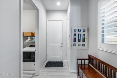 PRICED BELOW MARKET - MOVE-IN READY WITH OVER $73K IN BUILDER on Poston Butte Golf Club in Arizona - for sale on GolfHomes.com, golf home, golf lot