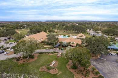 RARE OPPORTUNITY TO OWN A WATERFRONT CORNER VILLA NESTLED IN on Highland Lakes Executive Golf Course in Florida - for sale on GolfHomes.com, golf home, golf lot