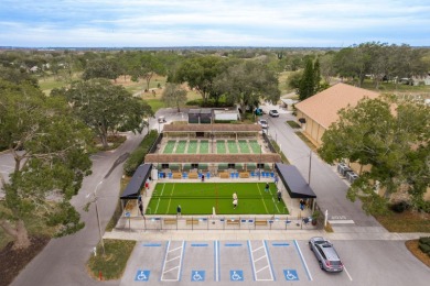 RARE OPPORTUNITY TO OWN A WATERFRONT CORNER VILLA NESTLED IN on Highland Lakes Executive Golf Course in Florida - for sale on GolfHomes.com, golf home, golf lot