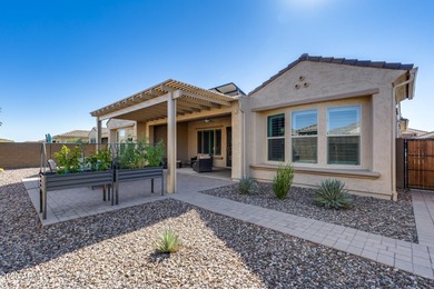 PRICED BELOW MARKET - MOVE-IN READY WITH OVER $73K IN BUILDER on Poston Butte Golf Club in Arizona - for sale on GolfHomes.com, golf home, golf lot