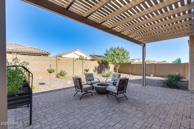 PRICED BELOW MARKET - MOVE-IN READY WITH OVER $73K IN BUILDER on Poston Butte Golf Club in Arizona - for sale on GolfHomes.com, golf home, golf lot