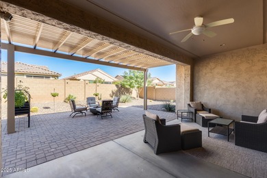 PRICED BELOW MARKET - MOVE-IN READY WITH OVER $73K IN BUILDER on Poston Butte Golf Club in Arizona - for sale on GolfHomes.com, golf home, golf lot