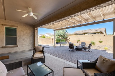 PRICED BELOW MARKET - MOVE-IN READY WITH OVER $73K IN BUILDER on Poston Butte Golf Club in Arizona - for sale on GolfHomes.com, golf home, golf lot