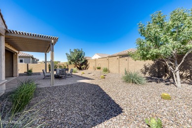 PRICED BELOW MARKET - MOVE-IN READY WITH OVER $73K IN BUILDER on Poston Butte Golf Club in Arizona - for sale on GolfHomes.com, golf home, golf lot