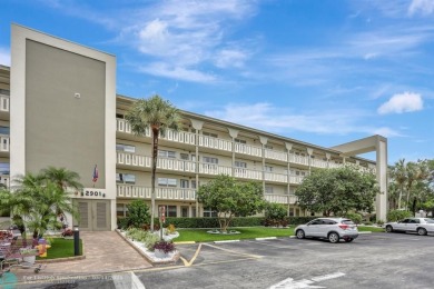 FULLY UPDATED UNIT BOASTING FULL IMPACT WINDOWS, DOORS & PATIO! on Wynmoor Golf Course in Florida - for sale on GolfHomes.com, golf home, golf lot