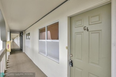 FULLY UPDATED UNIT BOASTING FULL IMPACT WINDOWS, DOORS & PATIO! on Wynmoor Golf Course in Florida - for sale on GolfHomes.com, golf home, golf lot