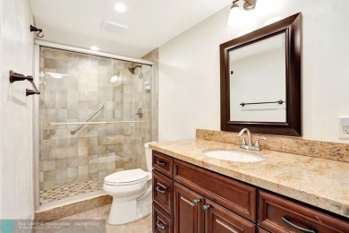 FULLY UPDATED UNIT BOASTING FULL IMPACT WINDOWS, DOORS & PATIO! on Wynmoor Golf Course in Florida - for sale on GolfHomes.com, golf home, golf lot
