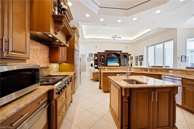 This exceptional 3-bedroom plus den, 3.5-bathroom estate home in on West Bay Beach and Golf Club in Florida - for sale on GolfHomes.com, golf home, golf lot