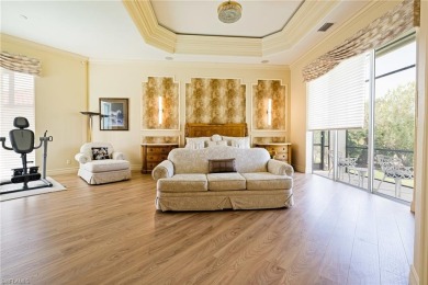 This exceptional 3-bedroom plus den, 3.5-bathroom estate home in on West Bay Beach and Golf Club in Florida - for sale on GolfHomes.com, golf home, golf lot