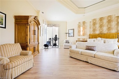 This exceptional 3-bedroom plus den, 3.5-bathroom estate home in on West Bay Beach and Golf Club in Florida - for sale on GolfHomes.com, golf home, golf lot