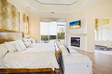 This exceptional 3-bedroom plus den, 3.5-bathroom estate home in on West Bay Beach and Golf Club in Florida - for sale on GolfHomes.com, golf home, golf lot