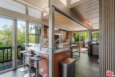 Mid century modern homes like this seldom become available for on Woodland Hills Country Club in California - for sale on GolfHomes.com, golf home, golf lot