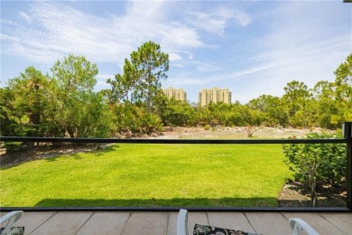 This exceptional 3-bedroom plus den, 3.5-bathroom estate home in on West Bay Beach and Golf Club in Florida - for sale on GolfHomes.com, golf home, golf lot