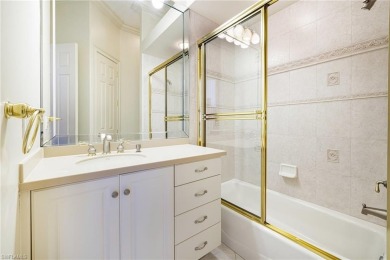 This exceptional 3-bedroom plus den, 3.5-bathroom estate home in on West Bay Beach and Golf Club in Florida - for sale on GolfHomes.com, golf home, golf lot