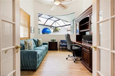 This exceptional 3-bedroom plus den, 3.5-bathroom estate home in on West Bay Beach and Golf Club in Florida - for sale on GolfHomes.com, golf home, golf lot