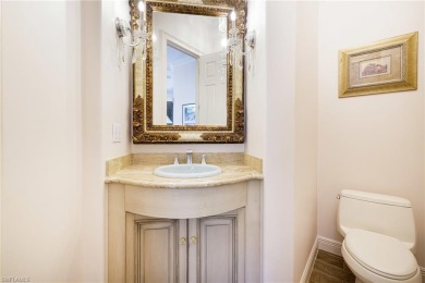 This exceptional 3-bedroom plus den, 3.5-bathroom estate home in on West Bay Beach and Golf Club in Florida - for sale on GolfHomes.com, golf home, golf lot