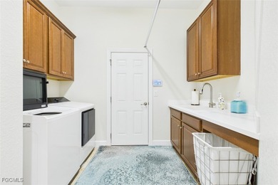 This stunning light-filled Jamison model offers the perfect on The Plantation Golf and Country Club in Florida - for sale on GolfHomes.com, golf home, golf lot