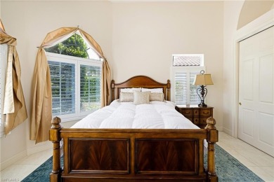 This exceptional 3-bedroom plus den, 3.5-bathroom estate home in on West Bay Beach and Golf Club in Florida - for sale on GolfHomes.com, golf home, golf lot