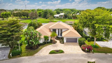 Exquisitely renovated 4BR/4BA lakefront estate in the desirable on  in Florida - for sale on GolfHomes.com, golf home, golf lot