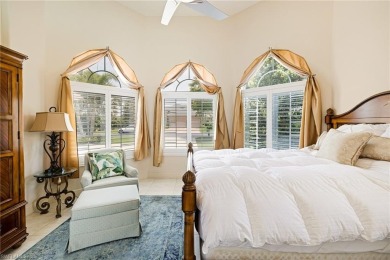 This exceptional 3-bedroom plus den, 3.5-bathroom estate home in on West Bay Beach and Golf Club in Florida - for sale on GolfHomes.com, golf home, golf lot
