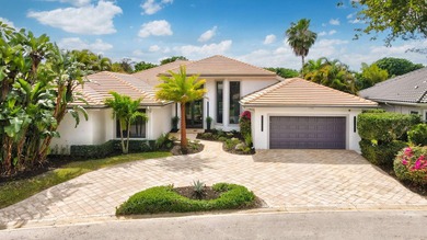 Exquisitely renovated 4BR/4BA lakefront estate in the desirable on  in Florida - for sale on GolfHomes.com, golf home, golf lot