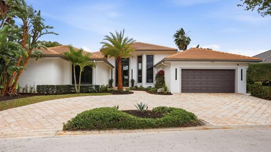 Exquisitely renovated 4BR/4BA lakefront estate in the desirable on  in Florida - for sale on GolfHomes.com, golf home, golf lot
