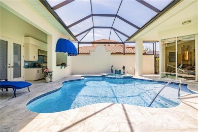 This exceptional 3-bedroom plus den, 3.5-bathroom estate home in on West Bay Beach and Golf Club in Florida - for sale on GolfHomes.com, golf home, golf lot
