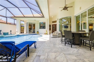 This exceptional 3-bedroom plus den, 3.5-bathroom estate home in on West Bay Beach and Golf Club in Florida - for sale on GolfHomes.com, golf home, golf lot
