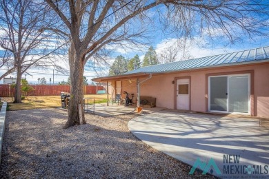 Cheerful, warm and inviting, this unique home is brimming with on Spring River Golf Course in New Mexico - for sale on GolfHomes.com, golf home, golf lot