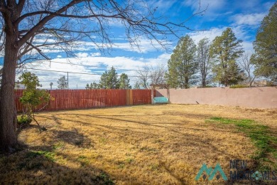 Cheerful, warm and inviting, this unique home is brimming with on Spring River Golf Course in New Mexico - for sale on GolfHomes.com, golf home, golf lot