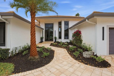 Exquisitely renovated 4BR/4BA lakefront estate in the desirable on  in Florida - for sale on GolfHomes.com, golf home, golf lot