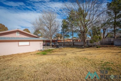 Cheerful, warm and inviting, this unique home is brimming with on Spring River Golf Course in New Mexico - for sale on GolfHomes.com, golf home, golf lot