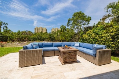 This exceptional 3-bedroom plus den, 3.5-bathroom estate home in on West Bay Beach and Golf Club in Florida - for sale on GolfHomes.com, golf home, golf lot