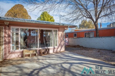 Cheerful, warm and inviting, this unique home is brimming with on Spring River Golf Course in New Mexico - for sale on GolfHomes.com, golf home, golf lot