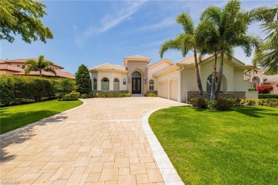 This exceptional 3-bedroom plus den, 3.5-bathroom estate home in on West Bay Beach and Golf Club in Florida - for sale on GolfHomes.com, golf home, golf lot