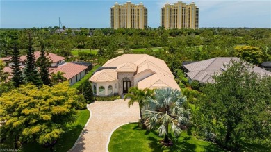 This exceptional 3-bedroom plus den, 3.5-bathroom estate home in on West Bay Beach and Golf Club in Florida - for sale on GolfHomes.com, golf home, golf lot