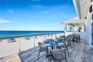 This exceptional 3-bedroom plus den, 3.5-bathroom estate home in on West Bay Beach and Golf Club in Florida - for sale on GolfHomes.com, golf home, golf lot