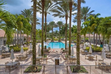 This exceptional 3-bedroom plus den, 3.5-bathroom estate home in on West Bay Beach and Golf Club in Florida - for sale on GolfHomes.com, golf home, golf lot