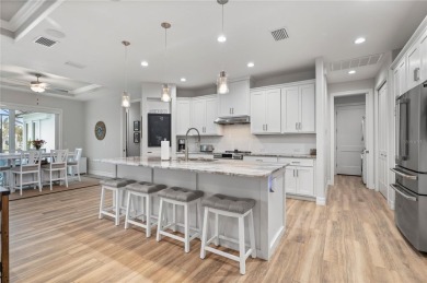 2023-built waterfront masterpiece in the highly sought-after on Saint Andrews South Golf Club in Florida - for sale on GolfHomes.com, golf home, golf lot