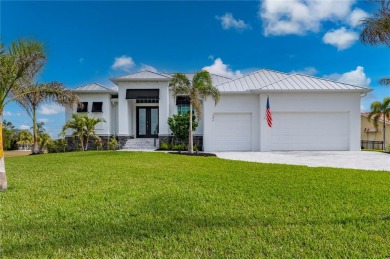 2023-built waterfront masterpiece in the highly sought-after on Saint Andrews South Golf Club in Florida - for sale on GolfHomes.com, golf home, golf lot