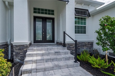 2023-built waterfront masterpiece in the highly sought-after on Saint Andrews South Golf Club in Florida - for sale on GolfHomes.com, golf home, golf lot