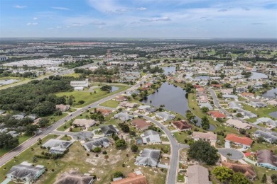 Short Sale. Spacious 2-bedroom, 2-bath, 2-car garage home in Sun on Caloosa Greens Executive Golf Course in Florida - for sale on GolfHomes.com, golf home, golf lot
