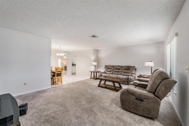 Short Sale. Spacious 2-bedroom, 2-bath, 2-car garage home in Sun on Caloosa Greens Executive Golf Course in Florida - for sale on GolfHomes.com, golf home, golf lot