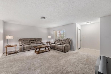 Short Sale. Spacious 2-bedroom, 2-bath, 2-car garage home in Sun on Caloosa Greens Executive Golf Course in Florida - for sale on GolfHomes.com, golf home, golf lot