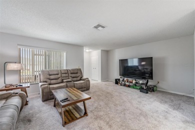 Short Sale. Spacious 2-bedroom, 2-bath, 2-car garage home in Sun on Caloosa Greens Executive Golf Course in Florida - for sale on GolfHomes.com, golf home, golf lot