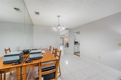 Short Sale. Spacious 2-bedroom, 2-bath, 2-car garage home in Sun on Caloosa Greens Executive Golf Course in Florida - for sale on GolfHomes.com, golf home, golf lot