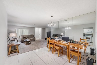 Short Sale. Spacious 2-bedroom, 2-bath, 2-car garage home in Sun on Caloosa Greens Executive Golf Course in Florida - for sale on GolfHomes.com, golf home, golf lot