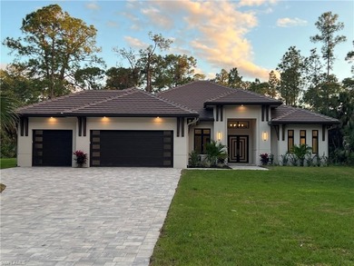 NEW CONSTRUCTION | GOLDEN GATE ESTATES | NAPLES Discover this on The Club At Twin Eagles in Florida - for sale on GolfHomes.com, golf home, golf lot