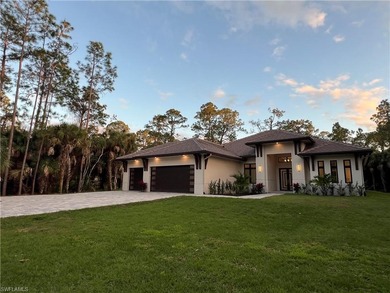 NEW CONSTRUCTION | GOLDEN GATE ESTATES | NAPLES Discover this on The Club At Twin Eagles in Florida - for sale on GolfHomes.com, golf home, golf lot